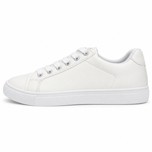 Side profile of fine-grain white low-top sneaker.