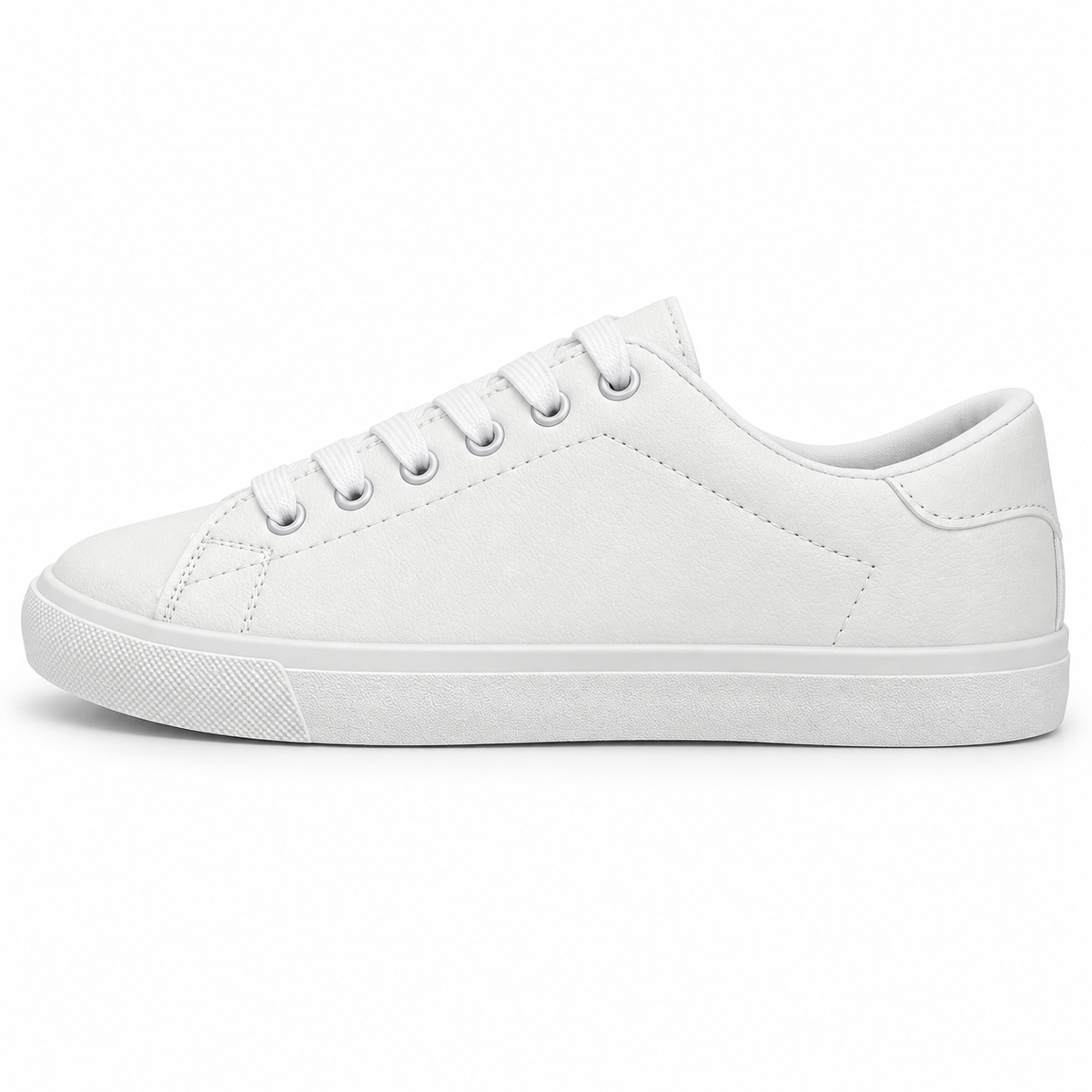 Side profile of textured all-white low-top sneaker.