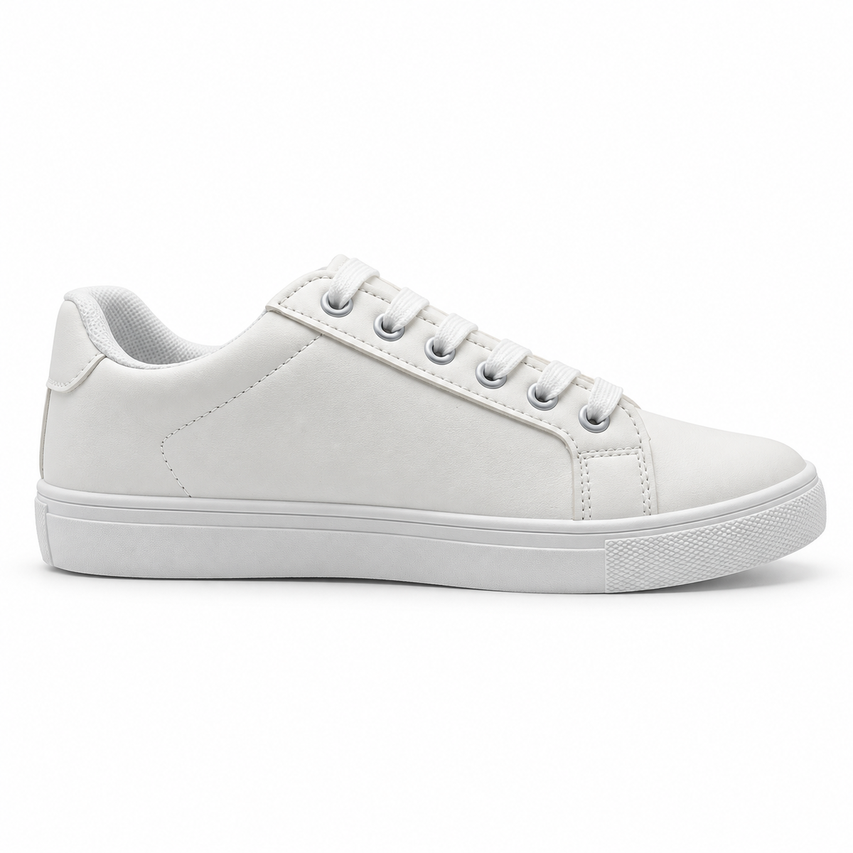 Opposite side profile of fine-grain white low-top sneaker.