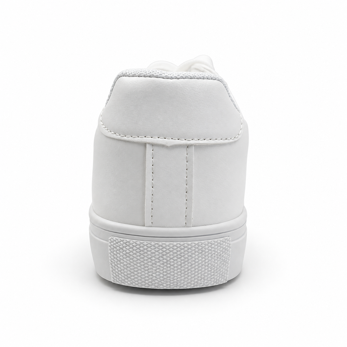 Rear heel view of fine-grain white low-top sneaker.
