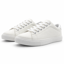 Pair, low front angle of textured all-white low-top sneaker.