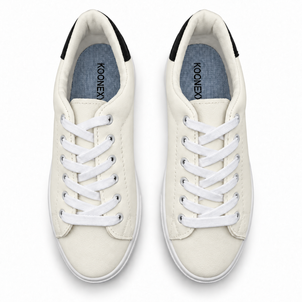 Pair, top view of warm off-white low-top sneaker with black heel patch.