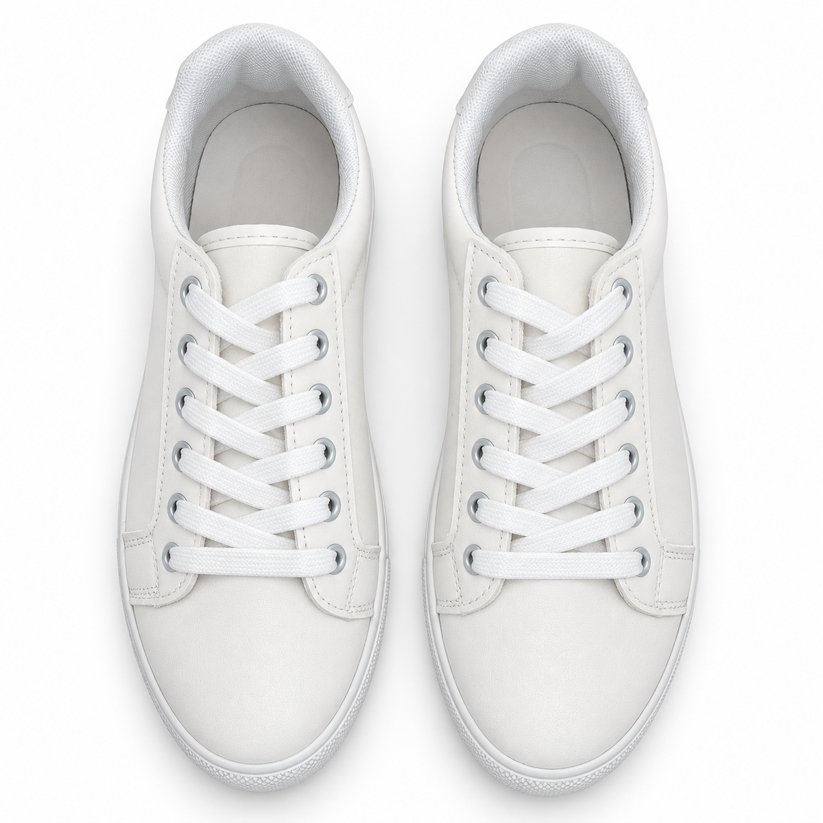 Pair, top view of fine-grain white low-top sneaker.