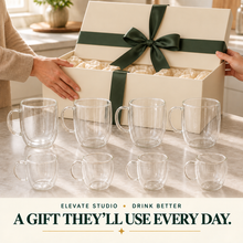 Eight-piece double-wall glass drinkware set presented in a gift box.