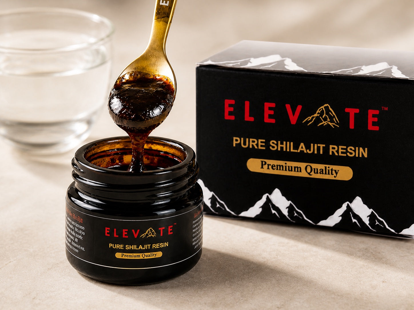 Elevate Pure Shilajit Resin jar, resin spoon, box, and warm water for Feel Better